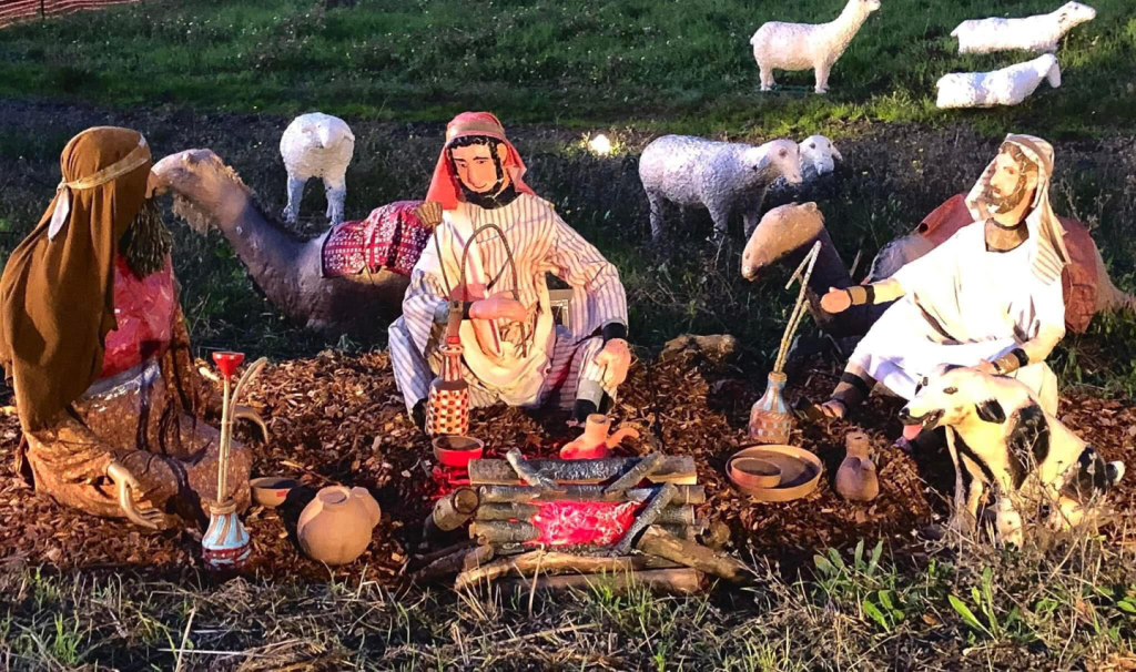 campfire figures at dusk