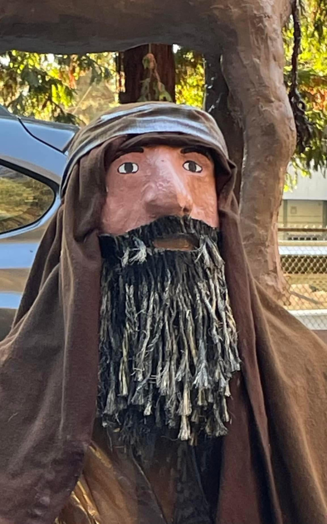 shepherd in brown clothes