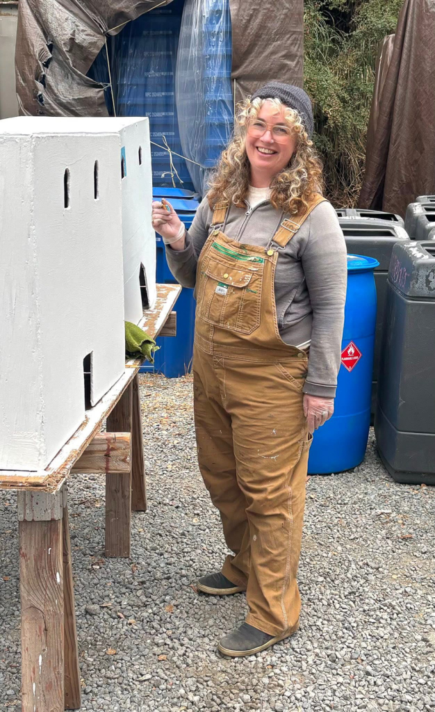 volunteer repainting Bethlehem building