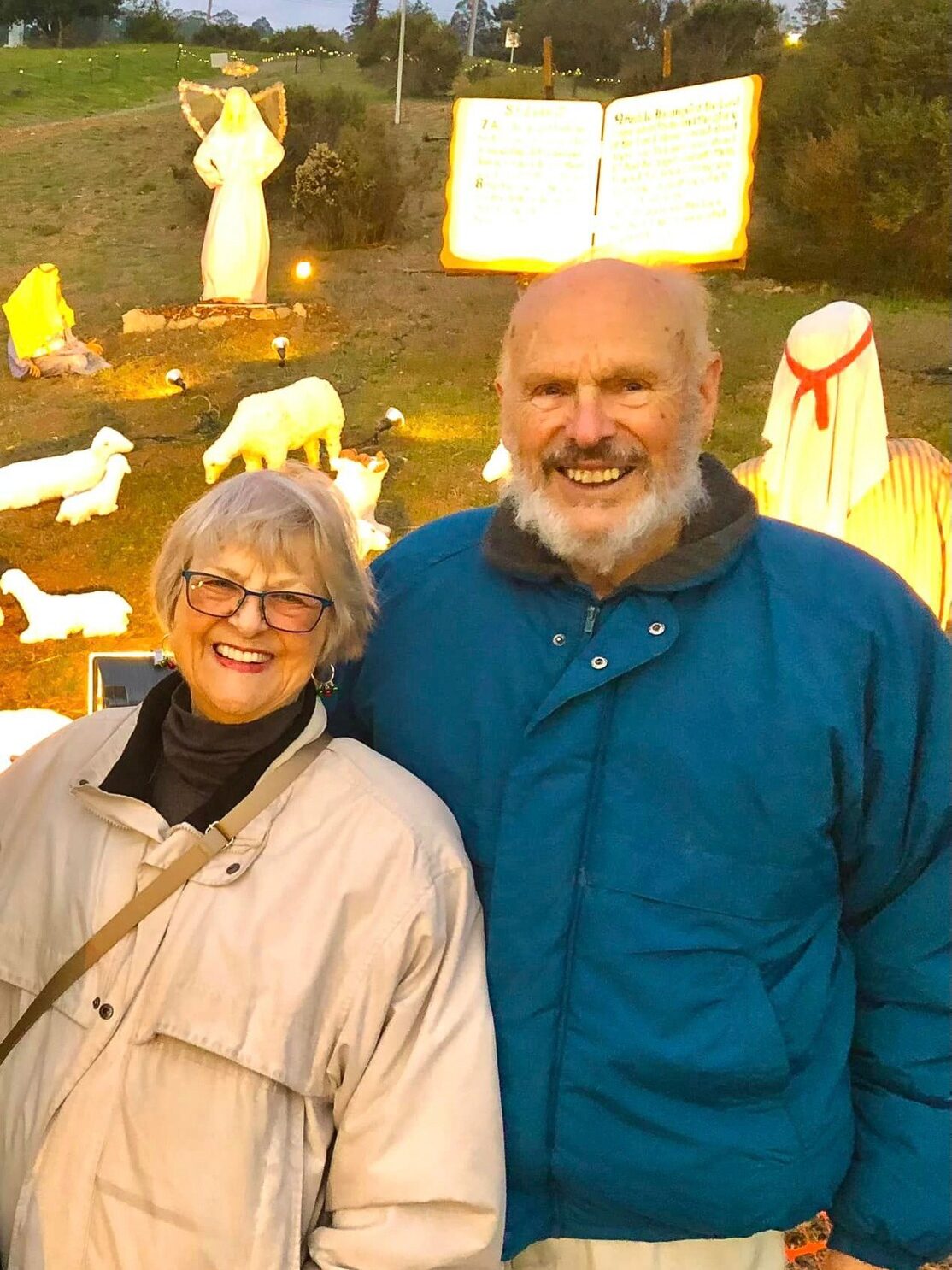 Jane and Rich Bartke in front of the shadi holiday display